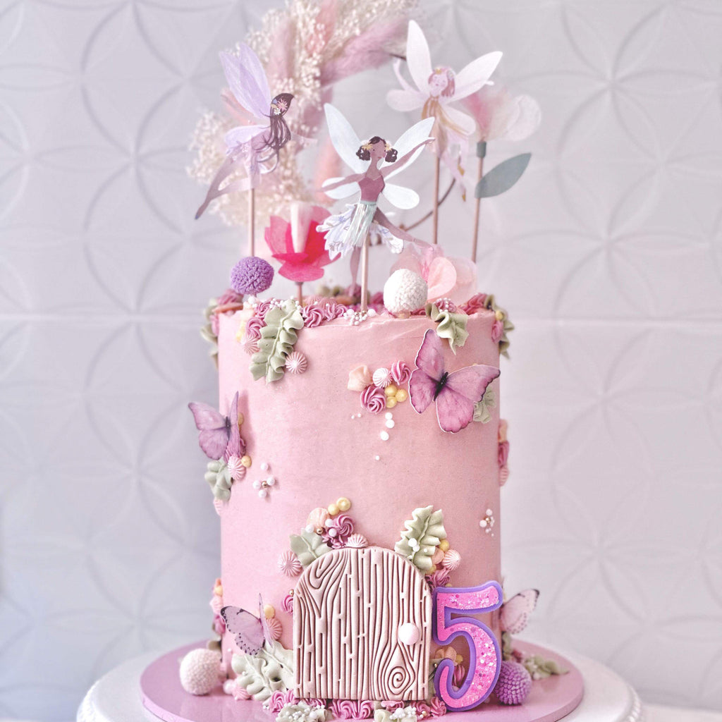 Fairy cake with dried flowers by sharrsbakehouse